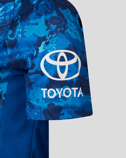 Close up of a blue camouflage England women's ODI World Cup replica shirt with a white Toyota logo on the sleeve
