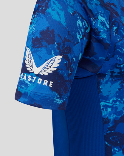 Close-up of blue camouflage England Cricket ODI World Cup women's replica shirt sleeve with white wing emblem