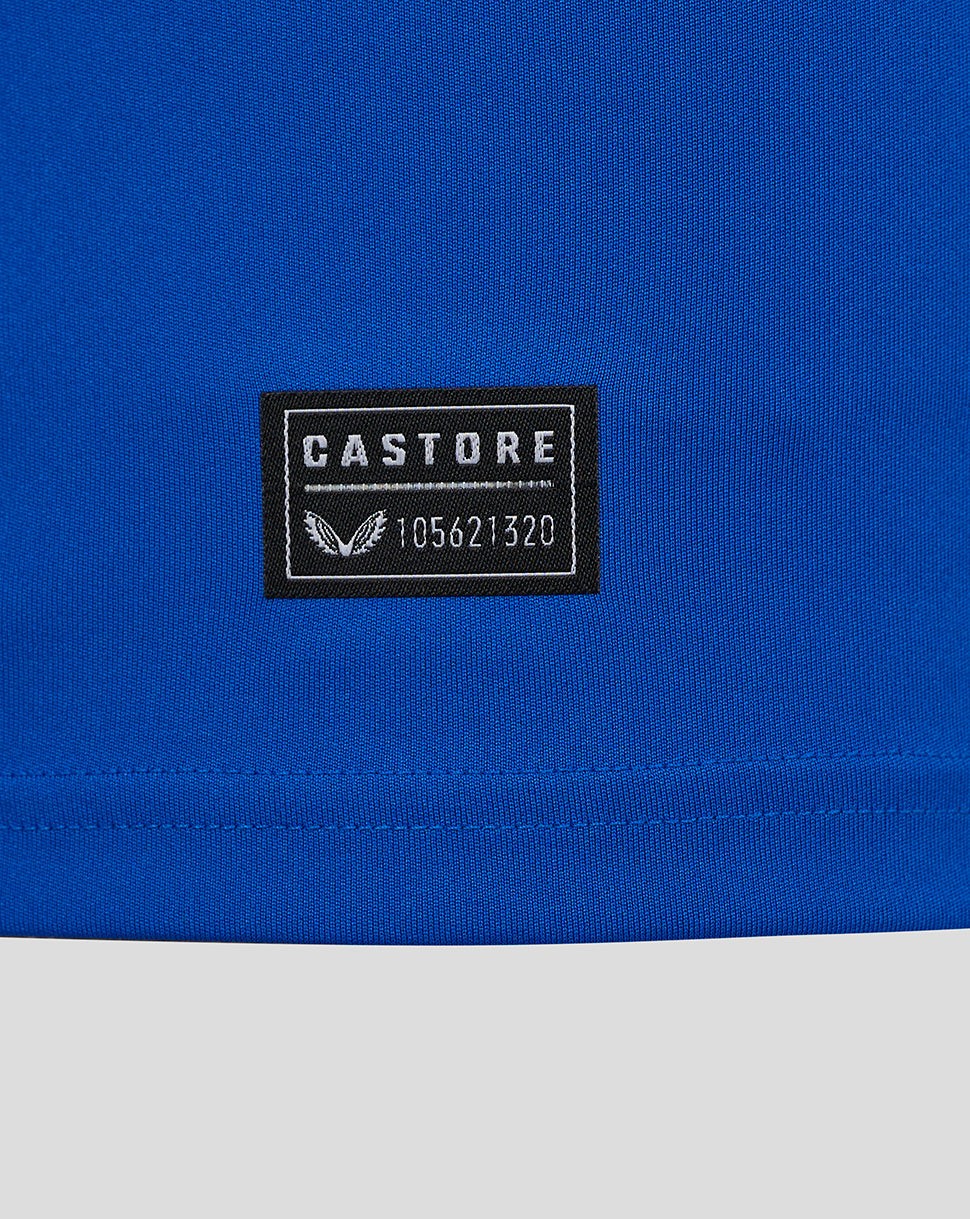 Close-up of blue fabric with Castore label patch on a Rangers Ibrox 125 jersey