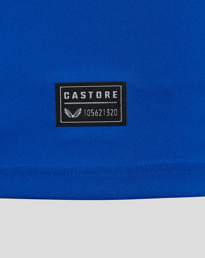 Close-up of blue fabric with Castore label patch on a Rangers Ibrox 125 jersey