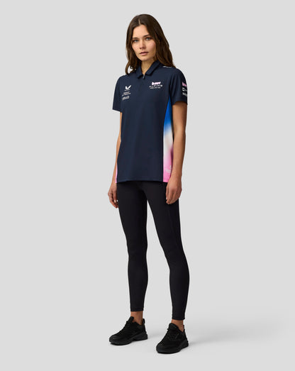 Model wearing navy BWT Alpine Formula One Team polo with center front zip and chest logos
