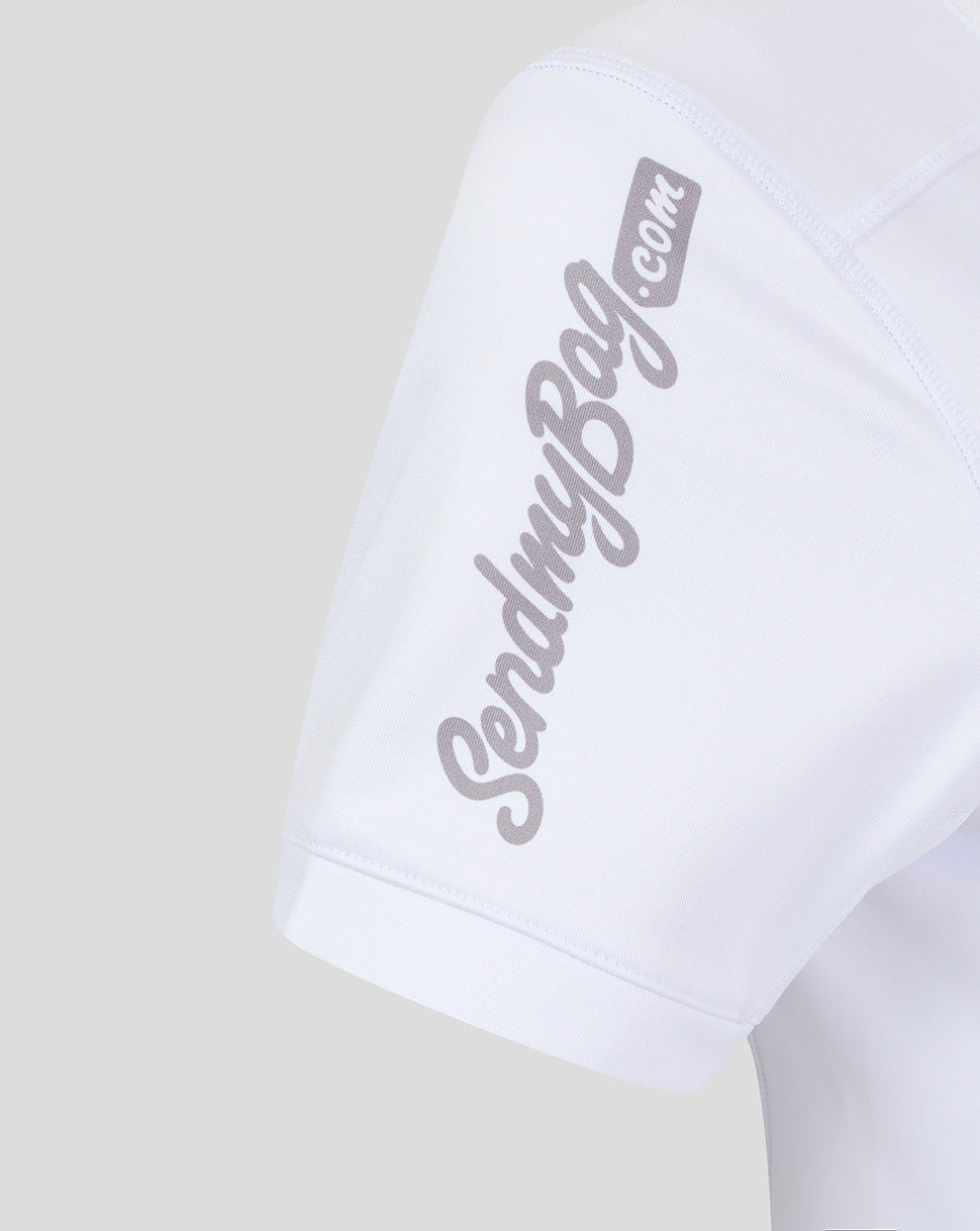 Close-up of the sleeve with diagonal printed branding on white fabric