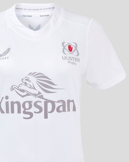 Detail of white Ulster women's rugby shirt with Ulster crest on the chest and large Kingspan logo across the front