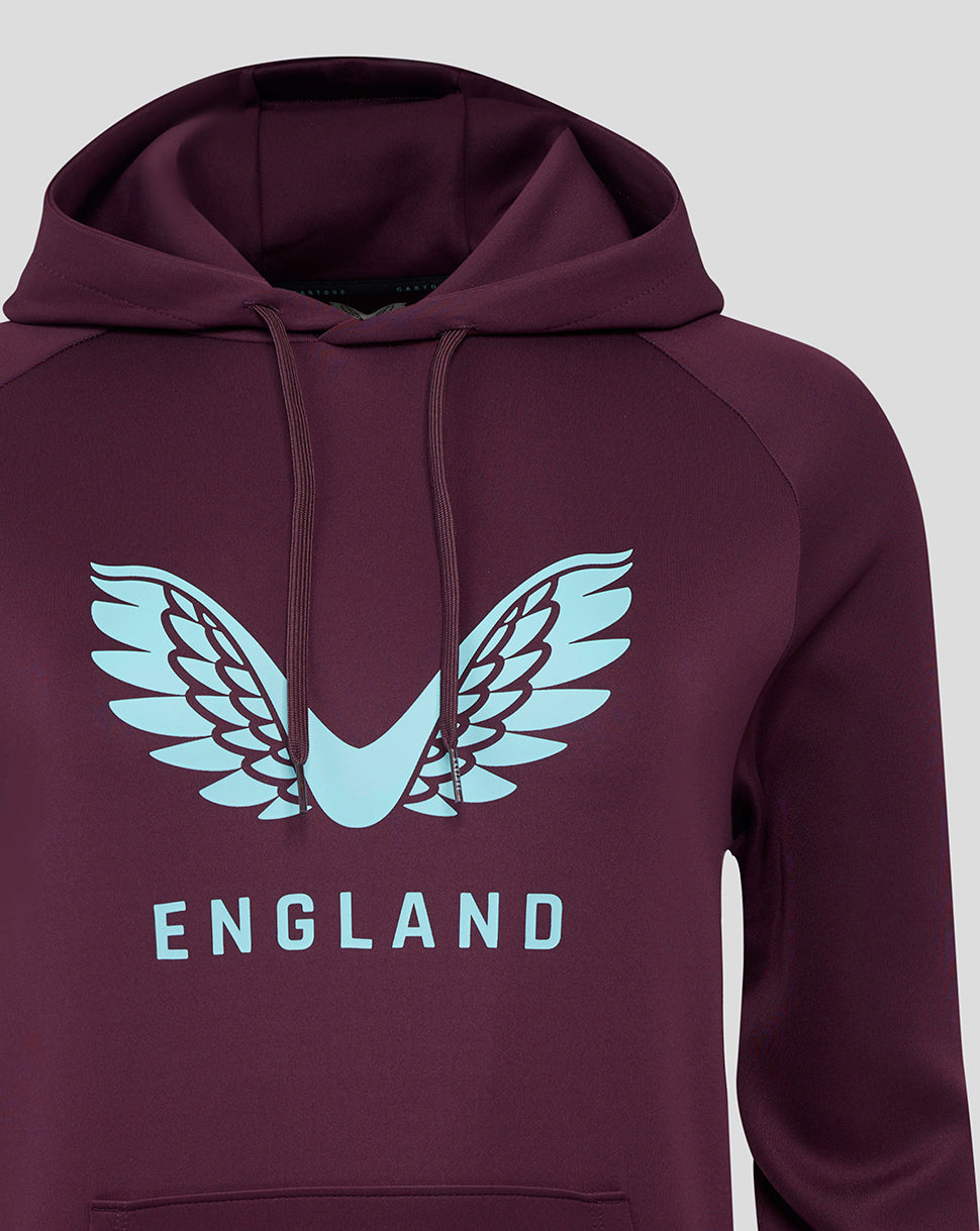 Close-up of light blue winged logo and ENGLAND text on a maroon hoodie.