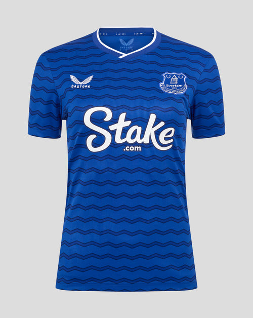 Blue Everton women's home shirt with a wavy pattern, club crest on the chest, Castore logo and Stake sponsor across front