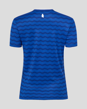 Back view of blue Everton women's home shirt with allover wavy pattern and small white neck logo