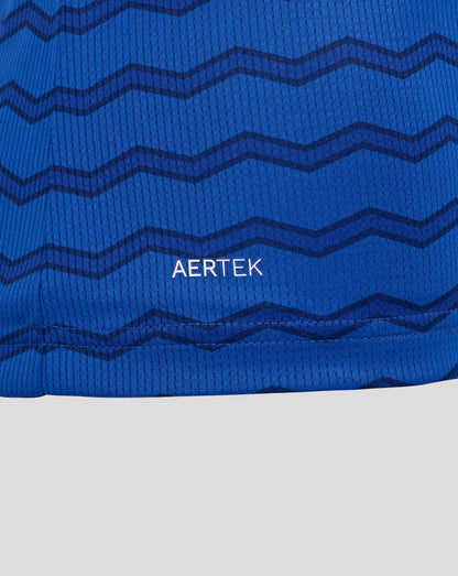 Close up of blue Everton FC women's home shirt fabric showing a dark zigzag pattern and AerTek texture.