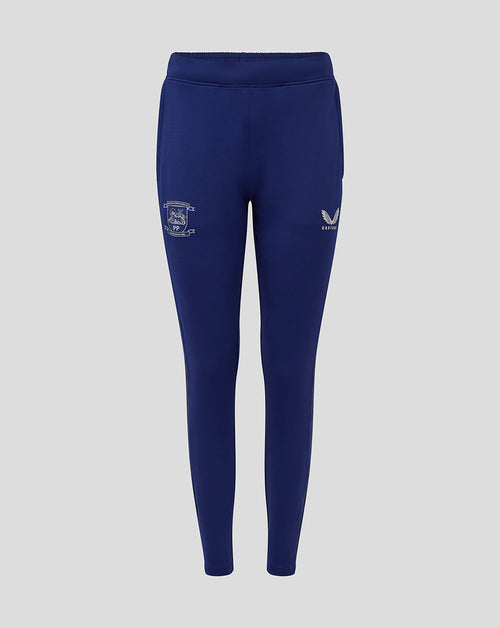Front view of blue Preston women's training knit pants with pockets and club crest