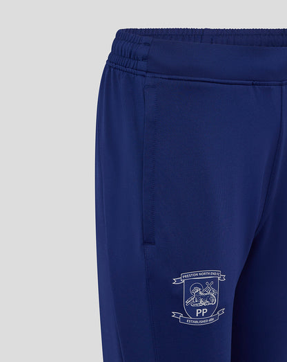 Waistband detail on blue Preston training pants with elastic band and internal drawcords