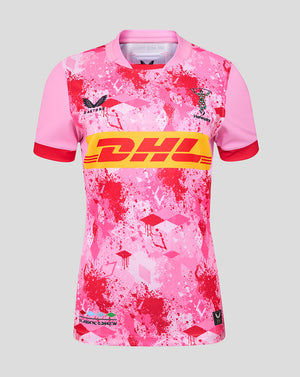 Front view of Harlequins Women 25/26 Away Pro Shirt in pink splatter print with DHL chest band