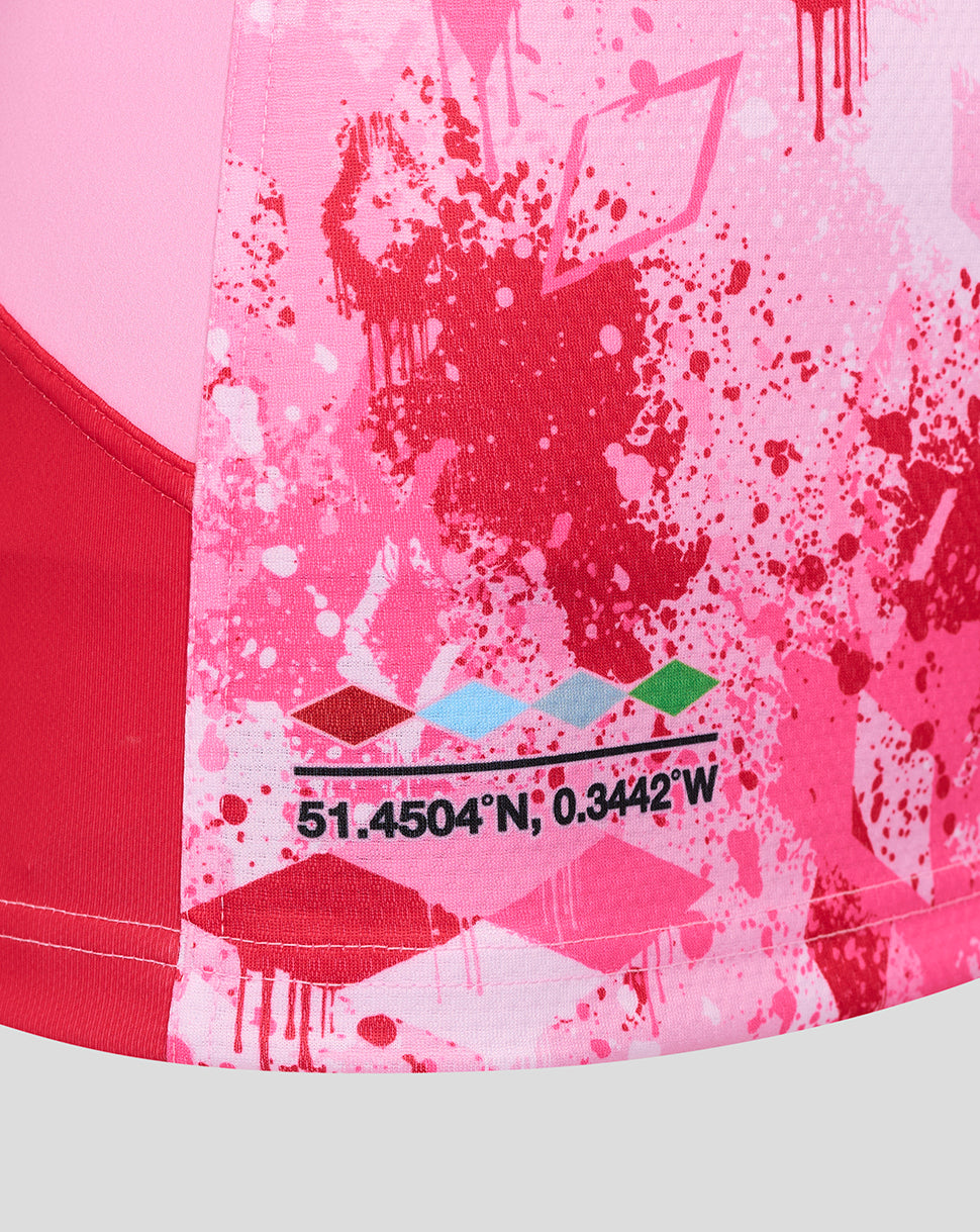 Pink Harlequins Away Pro Shirt close up showing splatter graphic and coordinates print on the front.
