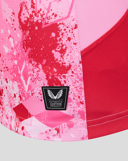 Close up of lower back hem on Harlequins Away Pro Shirt showing Authentic Castore Product patch