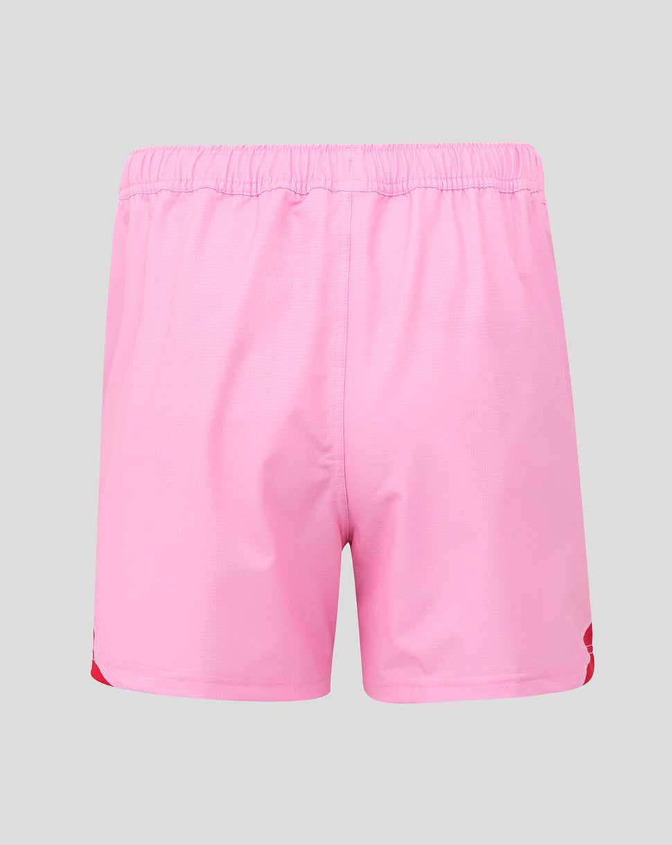 Back view of pink Harlequins shorts with an elasticated waistband and red hem detail