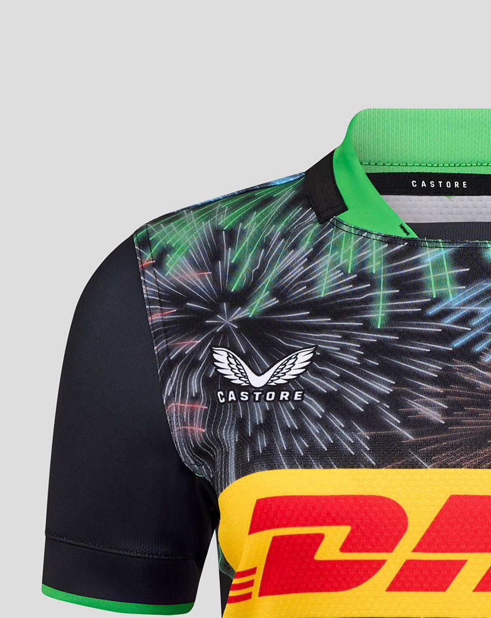 Close up of Harlequins Women's Pro Shirt chest area with crest and vibrant fireworks print.