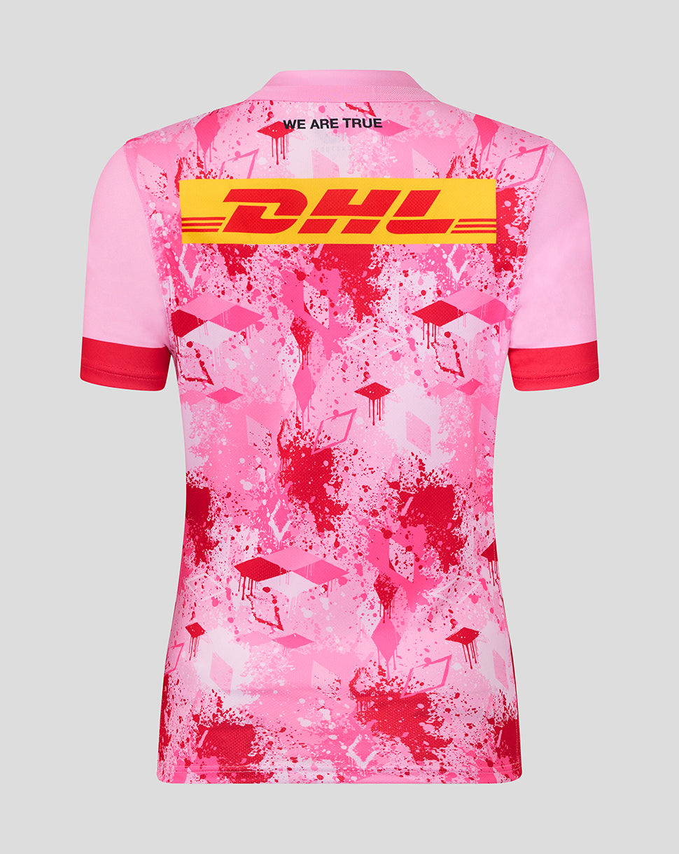 Back view of pink Harlequins away replica shirt with large yellow DHL logo across the upper back and splatter print