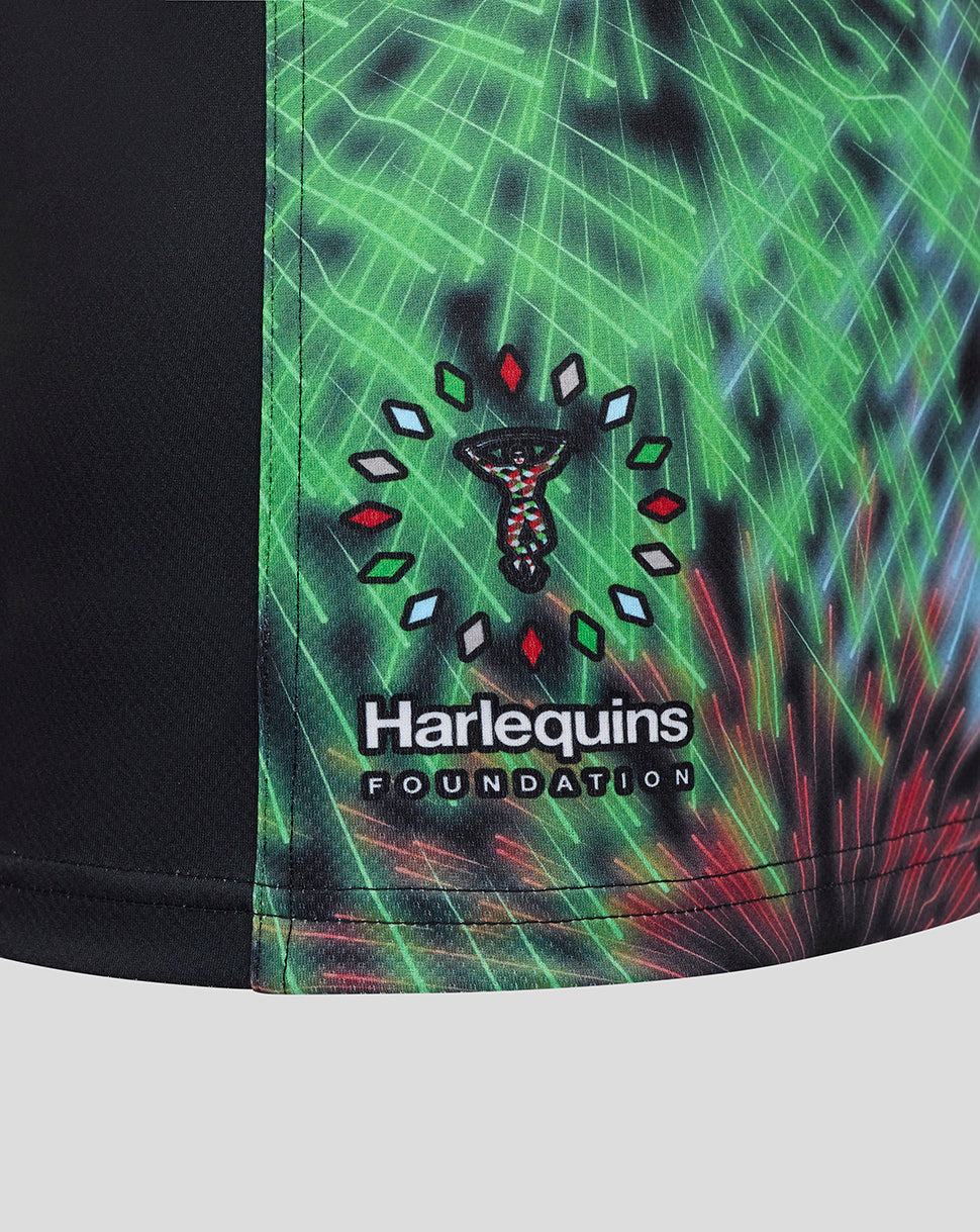 Side panel of the Harlequins replica shirt featuring a blue print and a Harlequins Foundation logo patch.