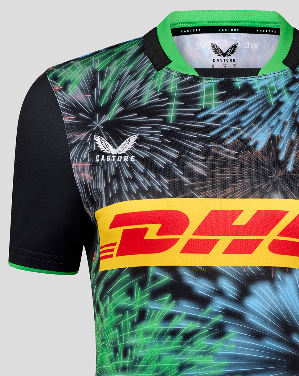 Detail of Harlequins Women's 25/26 Big Game Replica Shirt with green collar, black sleeves and vivid fireworks print.