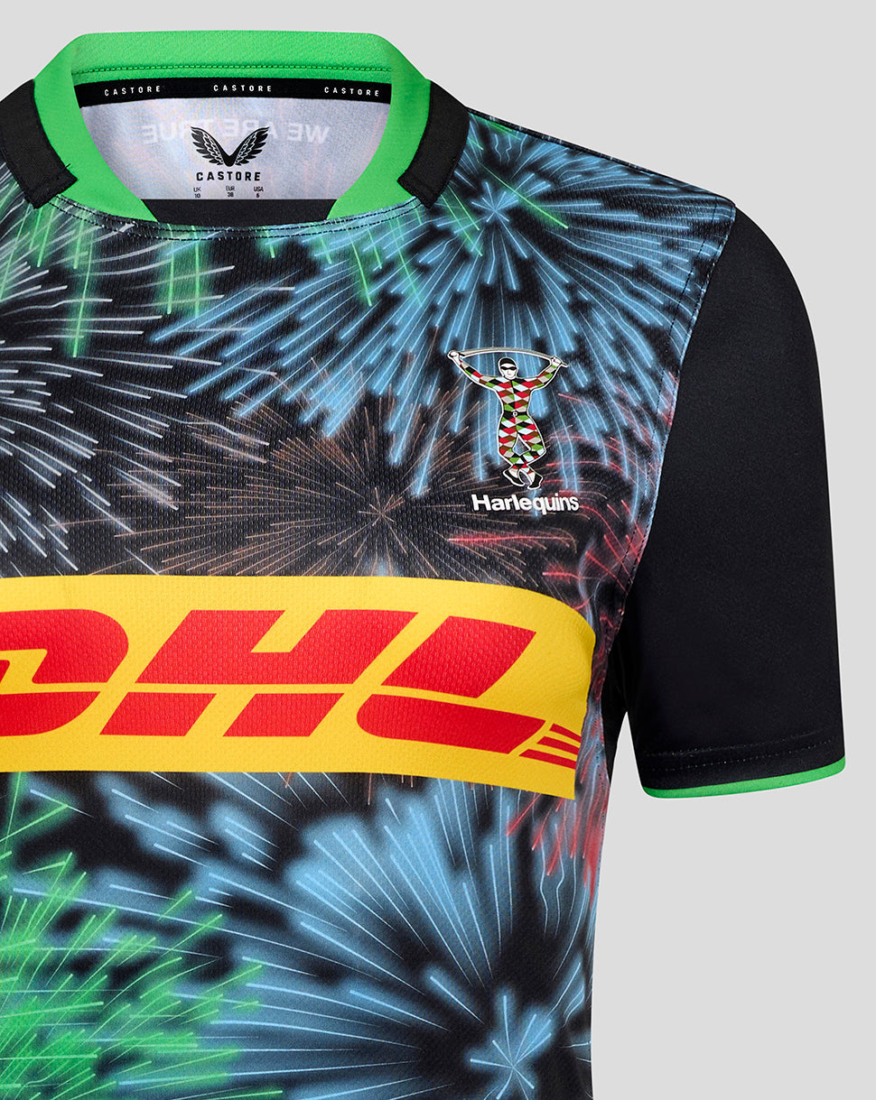 Close up of Harlequins Big Game replica shirt with a vibrant fireworks print, bold yellow DHL sponsor band, and club crest.