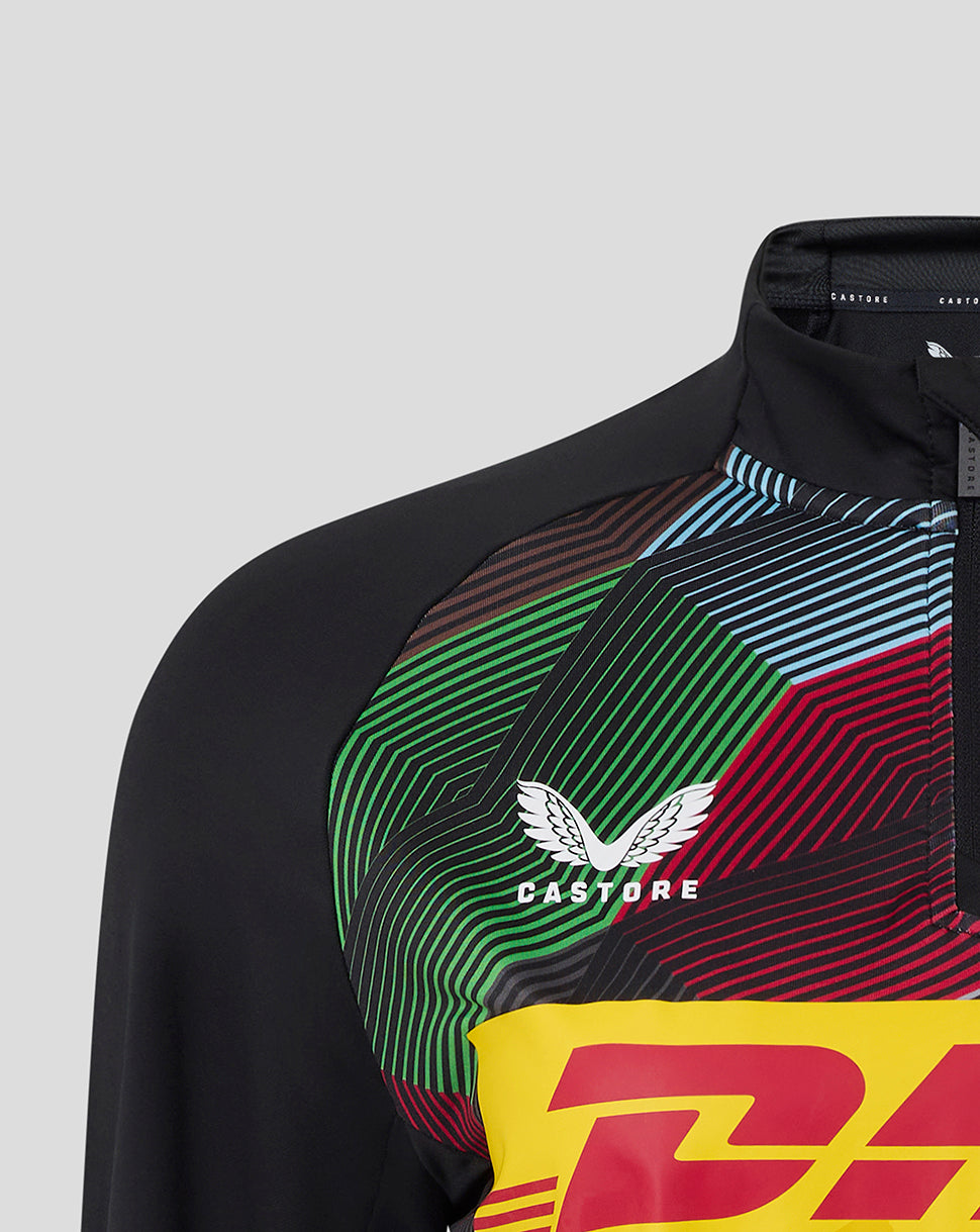 Harlequins Women's 25/26 Matchday Midlayer Top close-up of upper chest with crest and bold multi color geometric print
