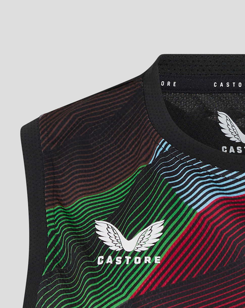 Close up of shoulder and neckline showing Castore branding on Harlequins sleeveless tee with vibrant pattern