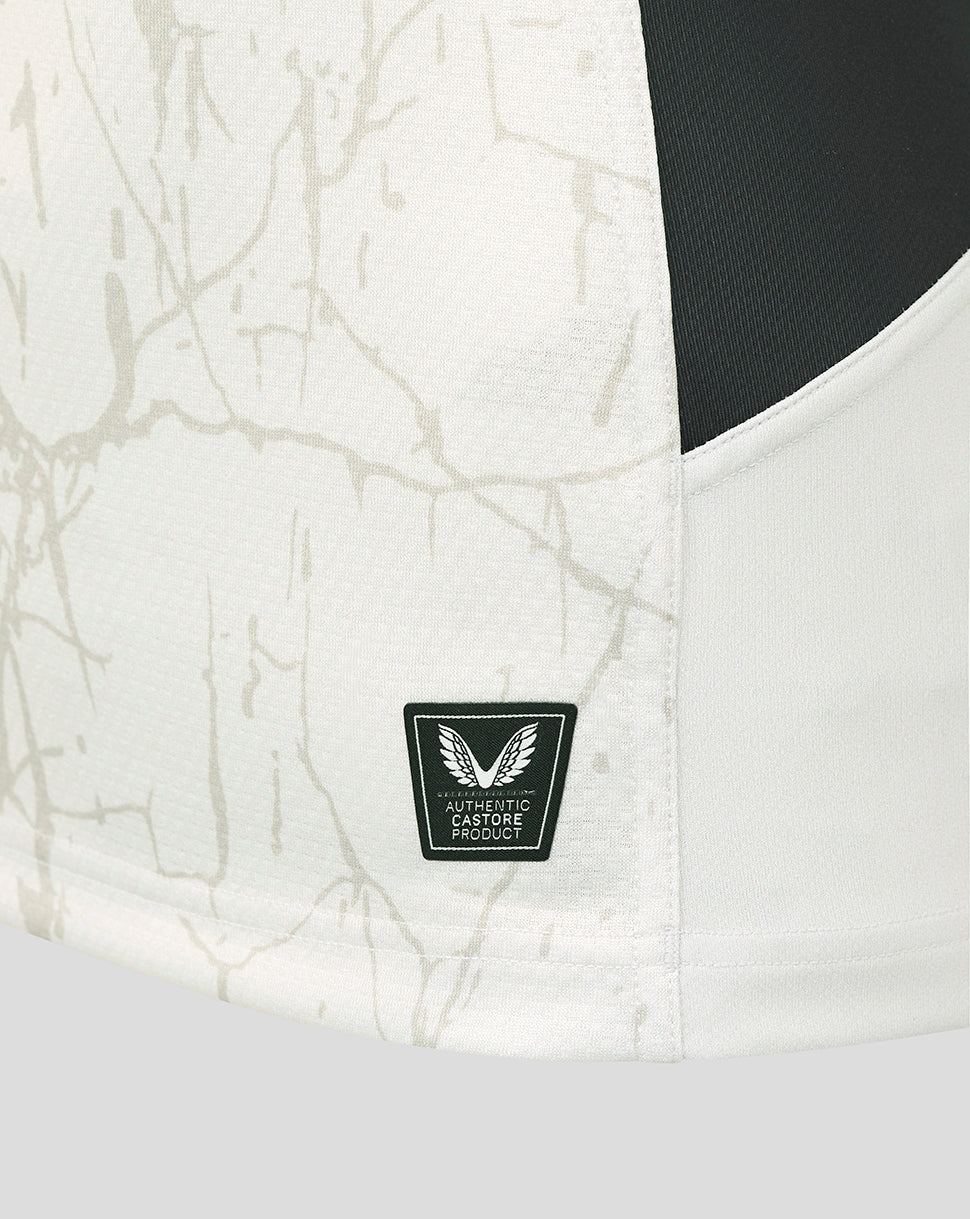 Close-up of the Saracens away shirt fabric with authentic Castore product badge near the hem.