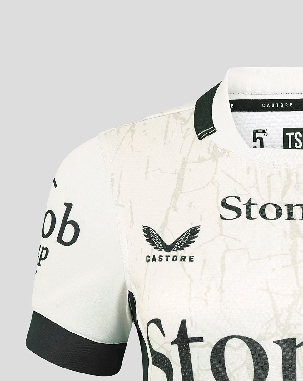 Left chest view of white Saracens Away Pro Shirt featuring crest Castore branding and beige marbled pattern