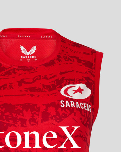Upper chest of the red Saracens matchday sleeveless tee with crest and large StoneX logo