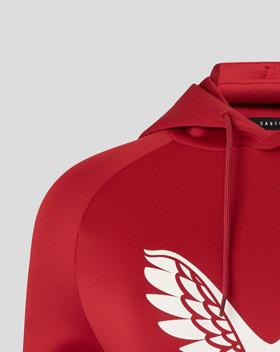 Close-up of the red hoodie shoulder and hood with drawstring and partial white wing graphic