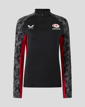Front view of black Saracens training 1/4 zip top with grey patterned sleeves and red side panels.