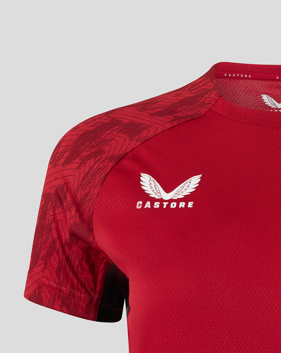 Red Saracens training short sleeve tee with white winged Castore logo on chest and patterned shoulder detail.