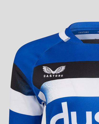 Shoulder and chest view of Bath Rugby replica shirt with blue fabric and Castore branding near the collar