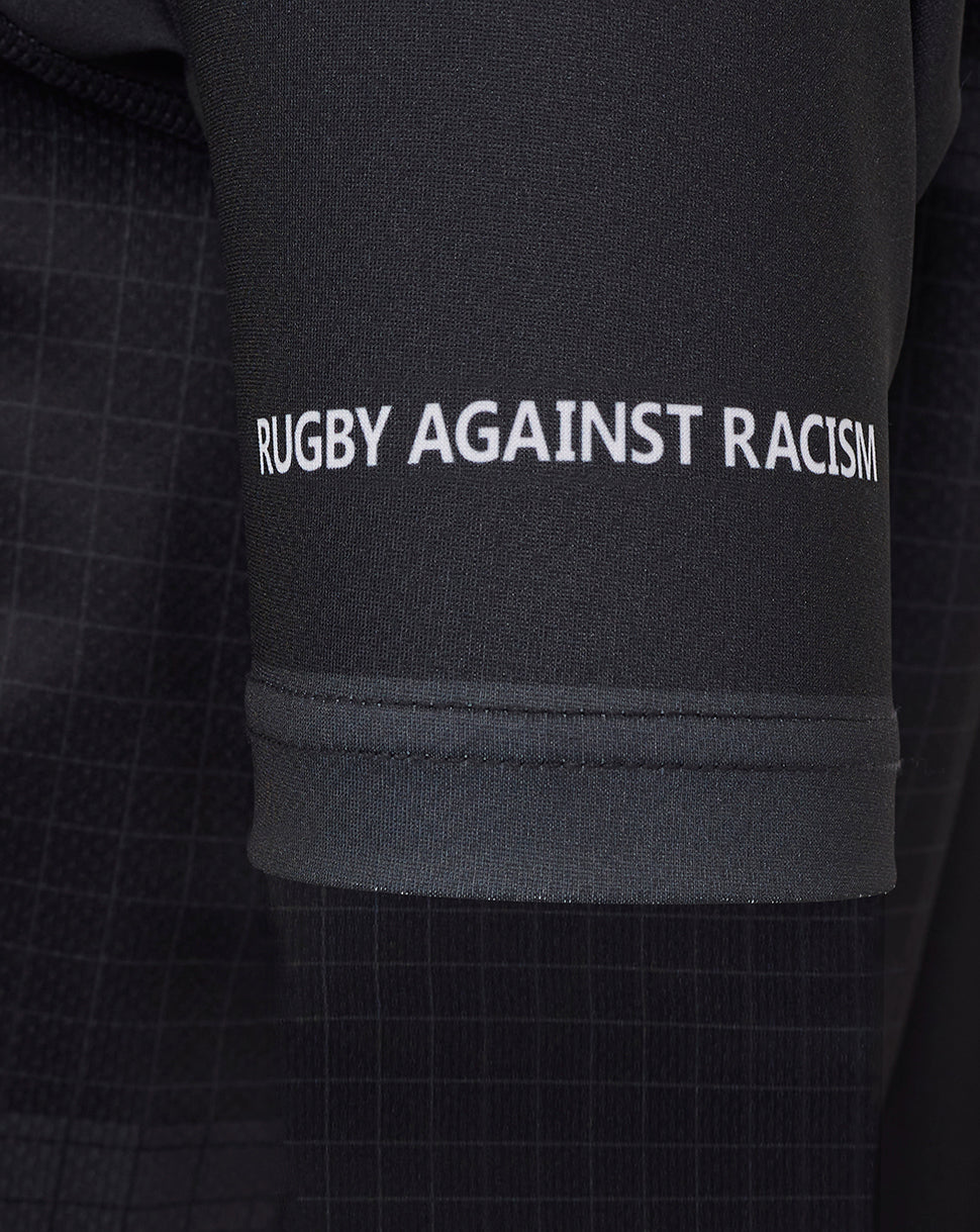 Sleeve close up on Bath Rugby replica shirt showing Rugby Against Racism message.