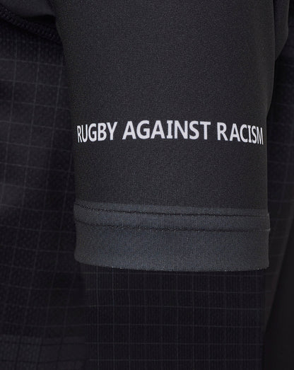 Sleeve close up on Bath Rugby replica shirt showing Rugby Against Racism message.