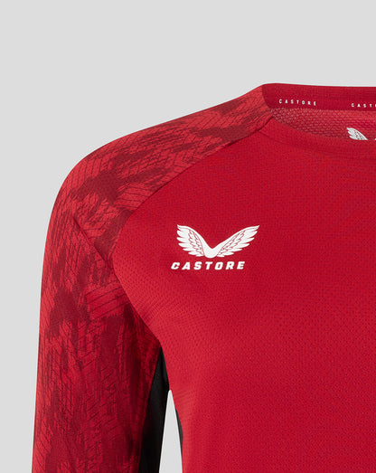 Red Saracens training long sleeve tee with white wing Castore crest on chest and textured shoulder panel