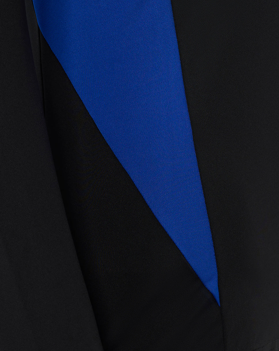 Close-up detail of Bath Rugby midlayer showing black fabric with a bold blue diagonal panel.