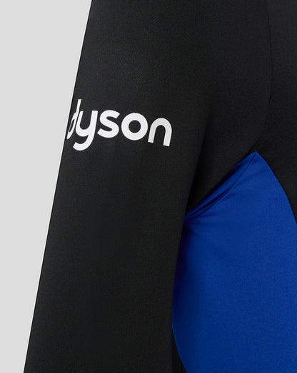 Sleeve close-up of the Bath Rugby midlayer showing white branding on black fabric with a blue underlayer.