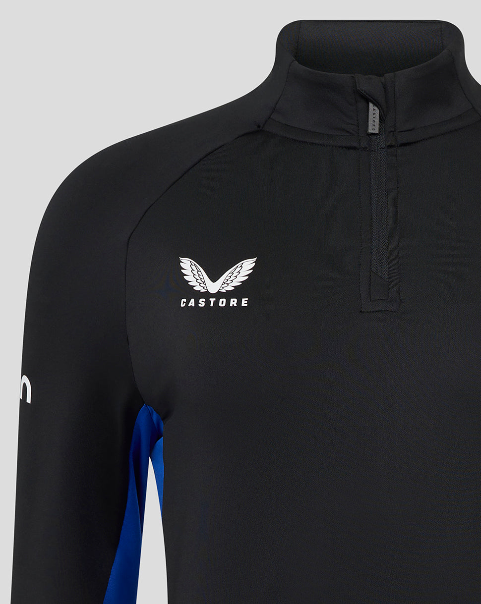 Shoulder and chest close-up of the black Bath Rugby midlayer with a blue side panel and Bath Rugby crest