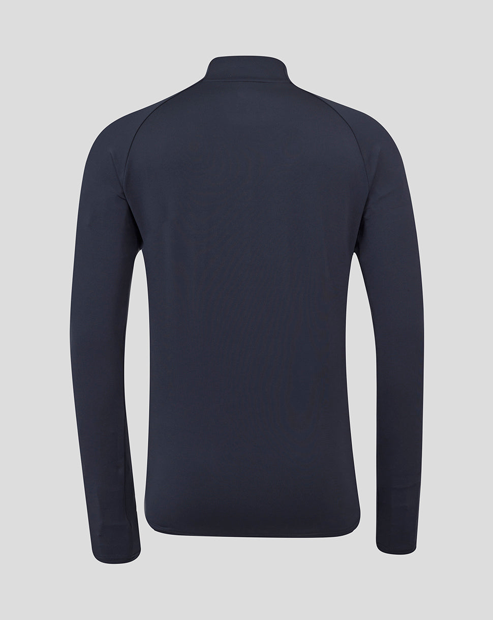 Back view of navy Inkwell performance midlayer top with funnel neck