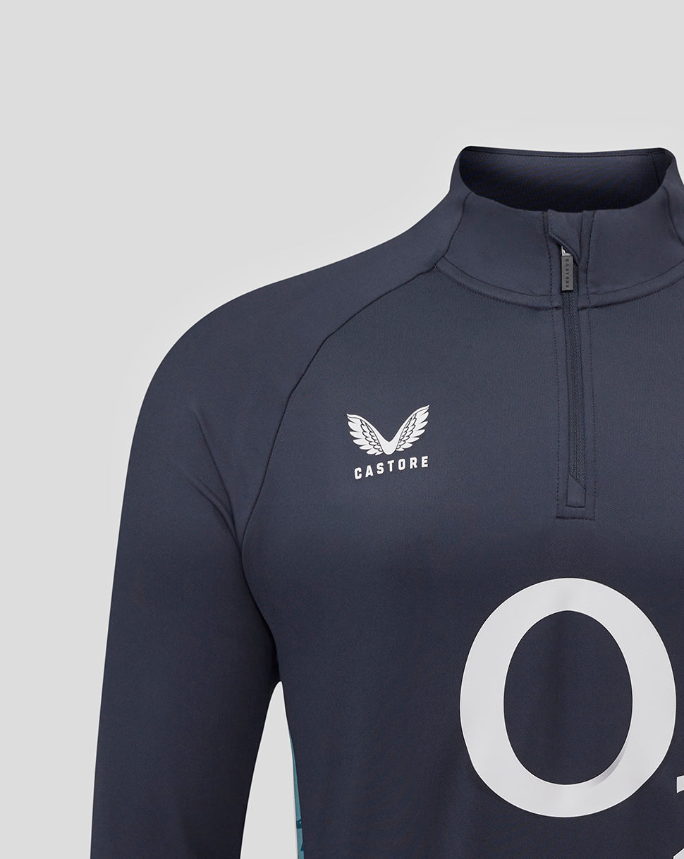 Close-up of navy midlayer chest showing Castore logo on the right chest