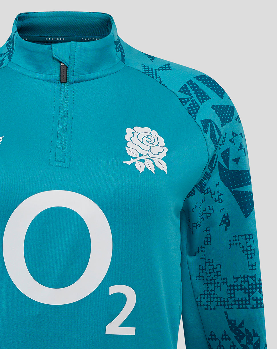 Close-up of funnel neck and quarter-zip on storm blue midlayer showing rose crest left chest O2 center and Castore right chest