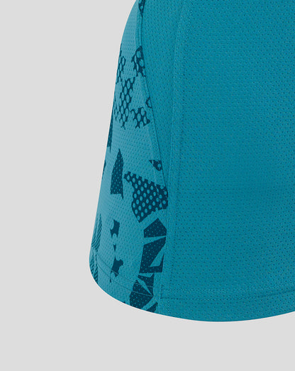 Side view close up of storm blue England Rugby Women’s sleeveless jersey featuring abstract print on side panel and textured fabric