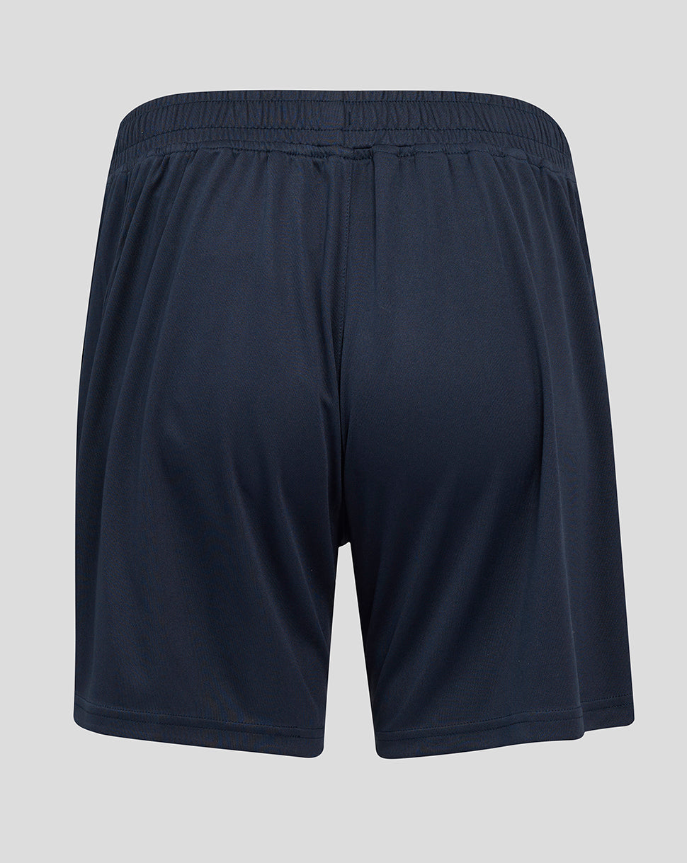 Back view of navy performance knit shorts with elastic waistband and teal side panel