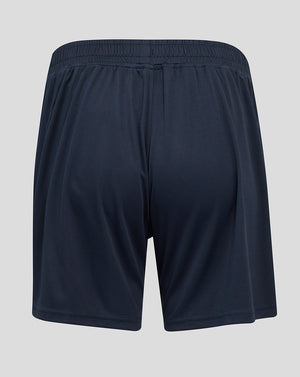 Back view of navy performance knit shorts with elastic waistband and teal side panel