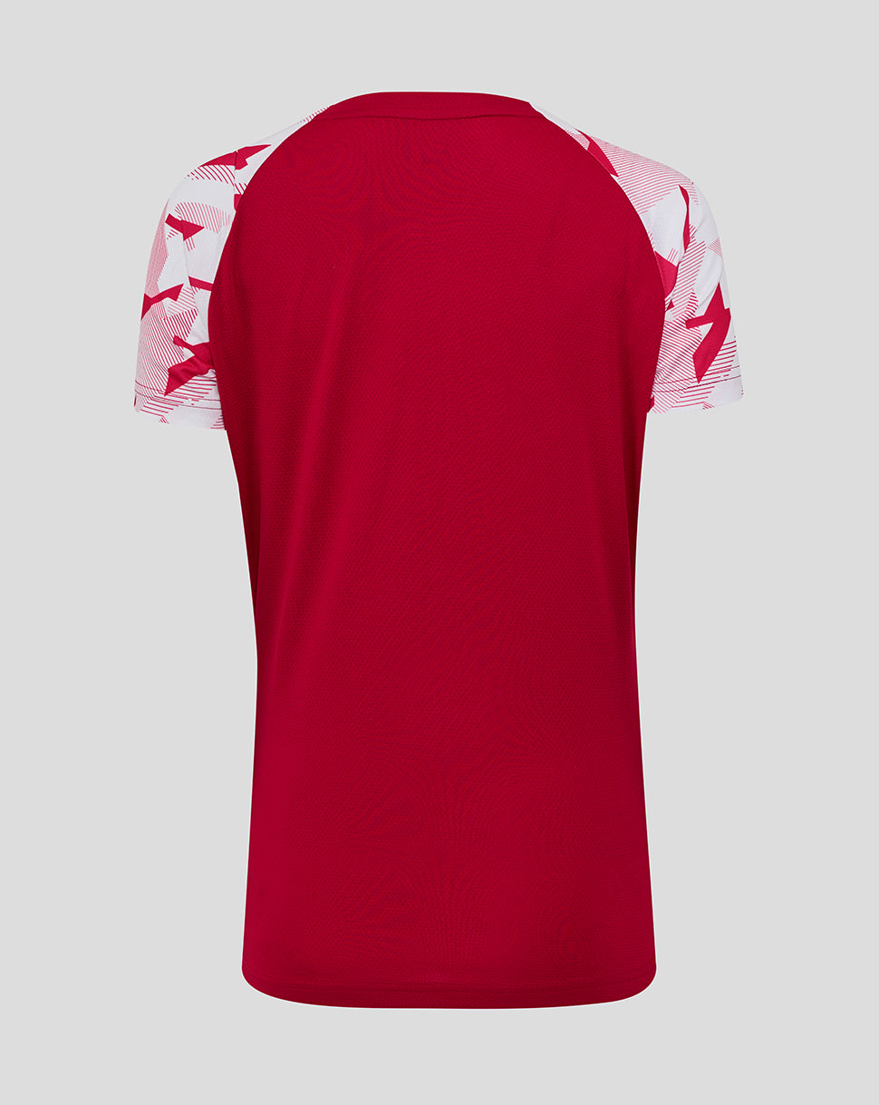 Back view of red pre match short sleeve T shirt with geometric white sleeve print