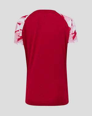 Back view of red pre match short sleeve T shirt with geometric white sleeve print