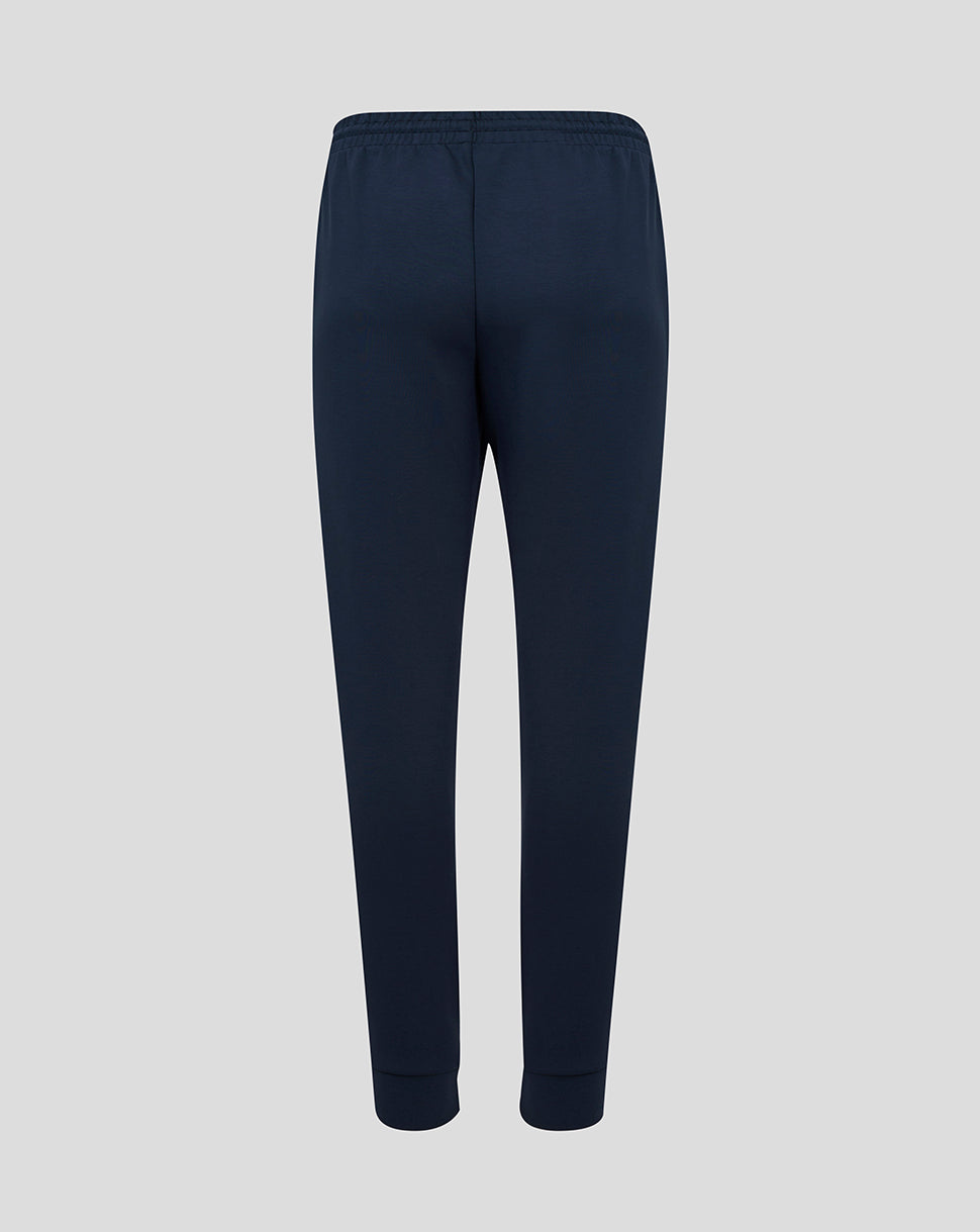 Back view of navy England Rugby Travel Knit Pant in Inkwell with drawcord waistband and ribbed cuffs