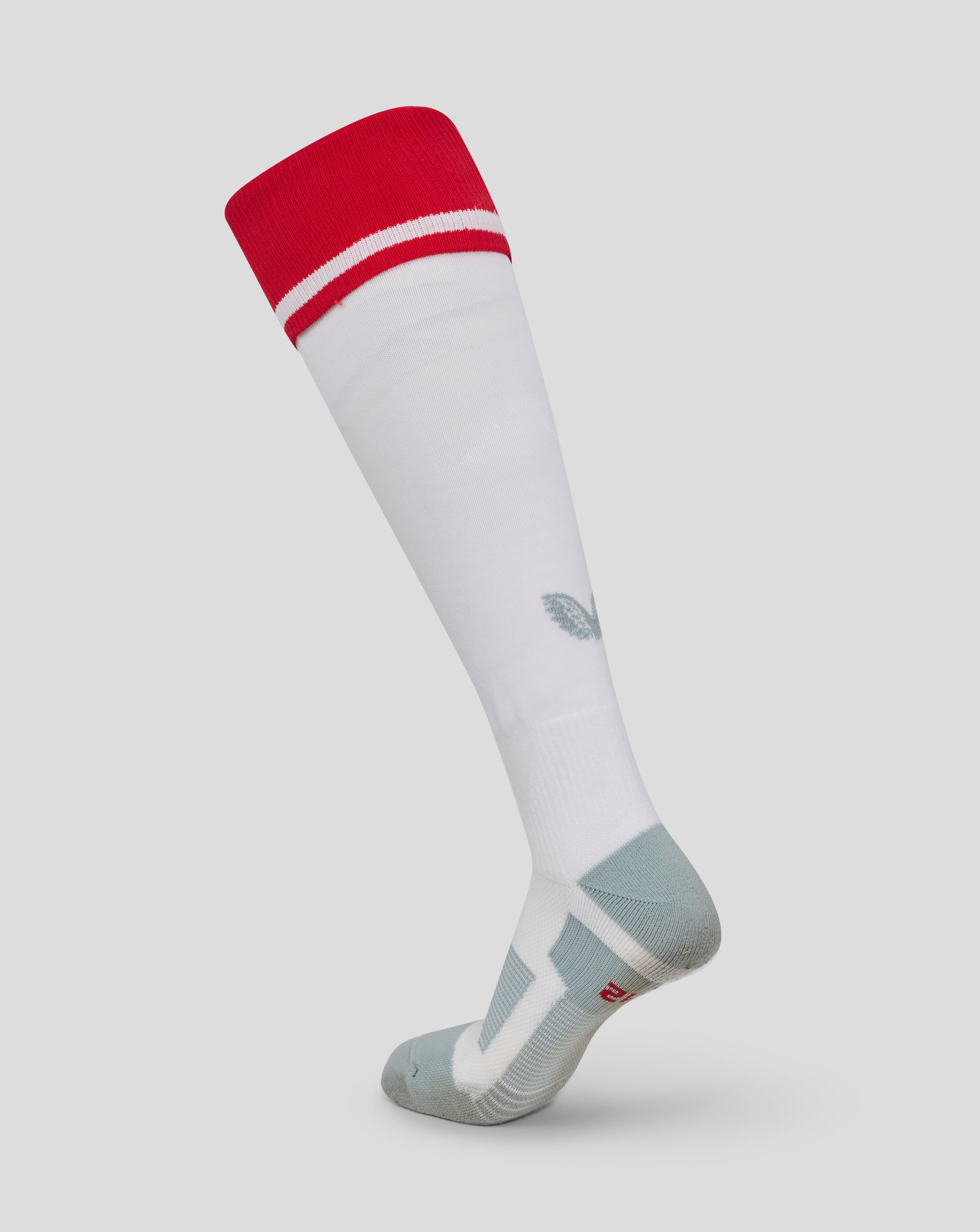 White knee-high sock with a red top band and white stripe, from the Red Roses Home Sock collection.