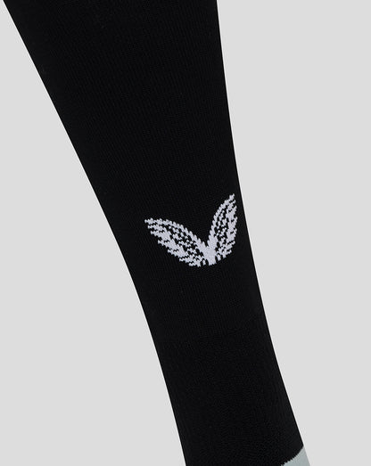 Black Red Roses Alternate Sock close-up showing a white rose emblem on the leg