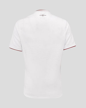 Back view of white England Rugby Home Shirt with red trim at sleeves and neck detail.