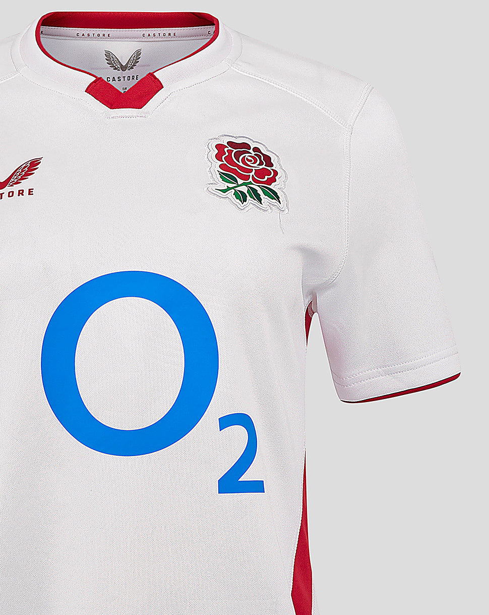 Close-up of white England Rugby Home Shirt showing rose crest on chest and large blue O2 sponsor.